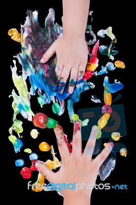 closeup-of-little-children-hands-doing-finger-painting-100389074