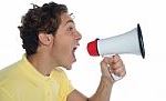 young-man-with-megaphone-10081310